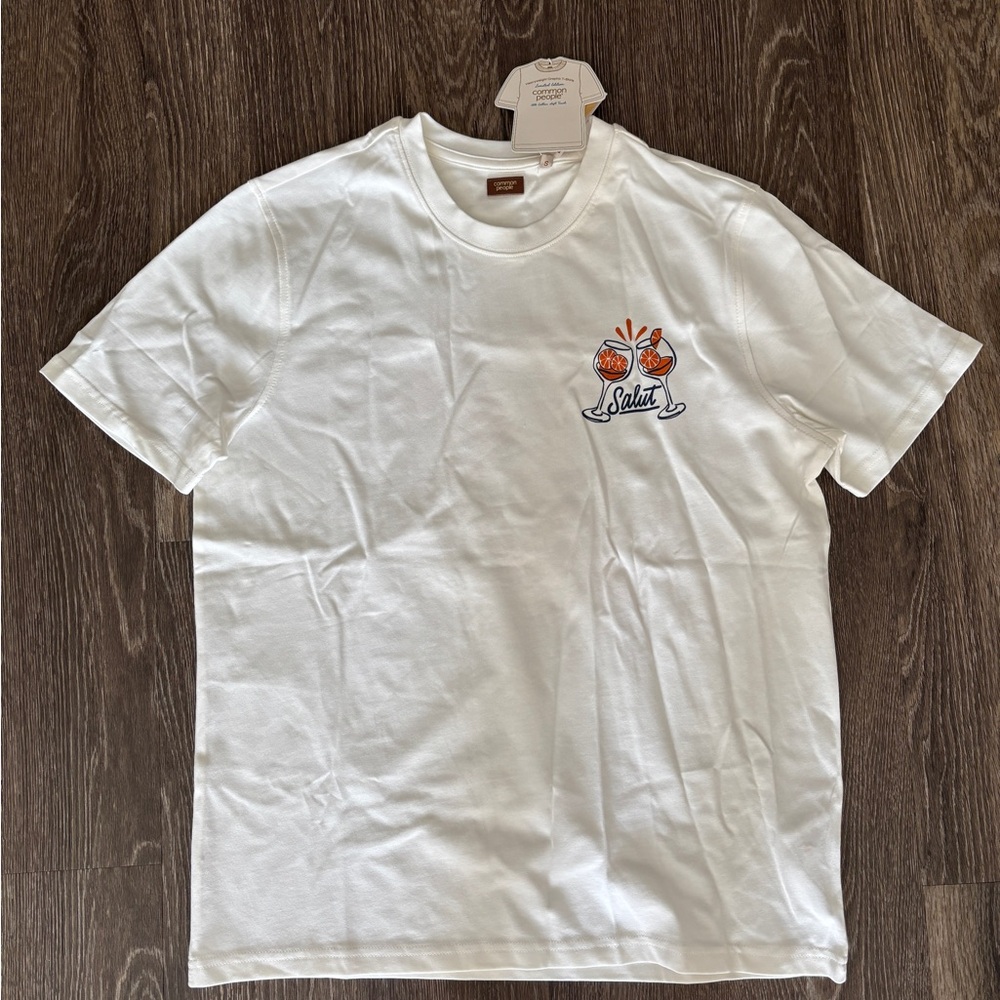 White Short Sleeve 'Salut' Graphic Tee with Orange Accent